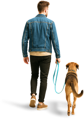 A person happily holding their pet